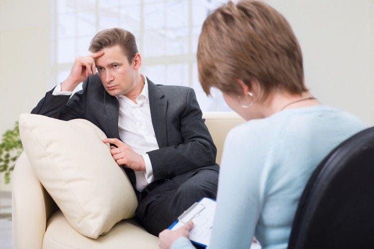 Substance abuse counselor working with patient