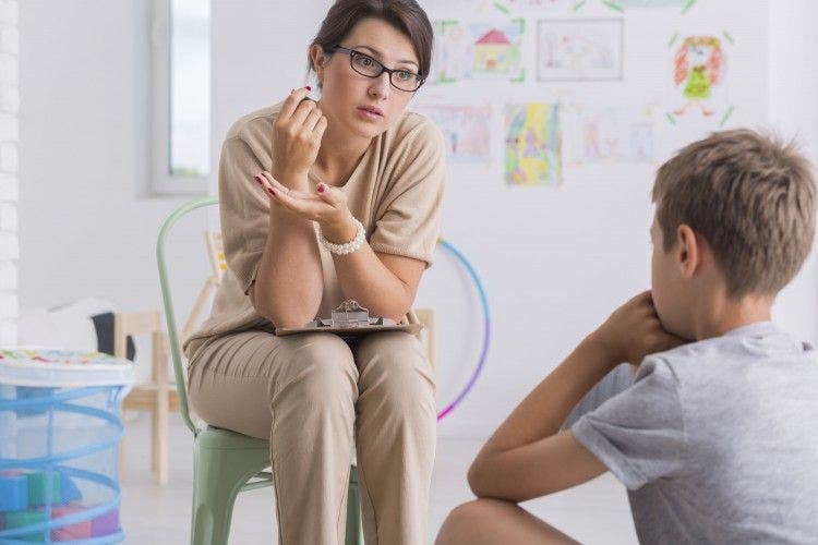 school counselor works with a student